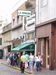 People line up to get into favorite parrillas...