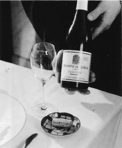 ❻ Present the cork to the host on a small plate or underliner for his or her inspection. If you have opened the bottle away from the table, present it again.